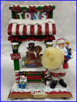 Christopher Radko Toy Shop Santa SnowGlobe Music We Wish You a Merry Christmas