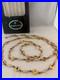 Vntg_Christopher_Radko_74_Handblown_Glass_Jeweled_Gold_Shell_Garland_Ornament_01_ccta